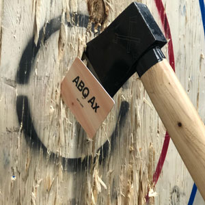 ABQ aAX featured image ax in wooden target